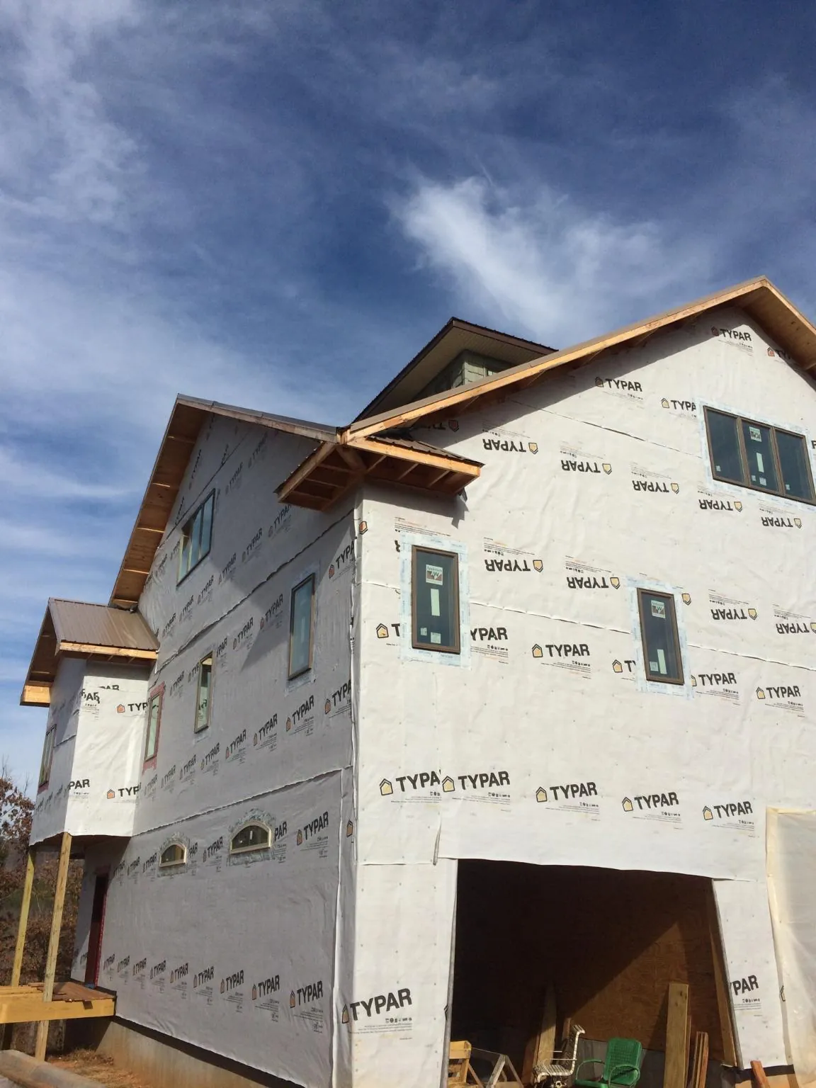 Stick built house wrapped in Typar with new roof framing and dormers in Sanbornville